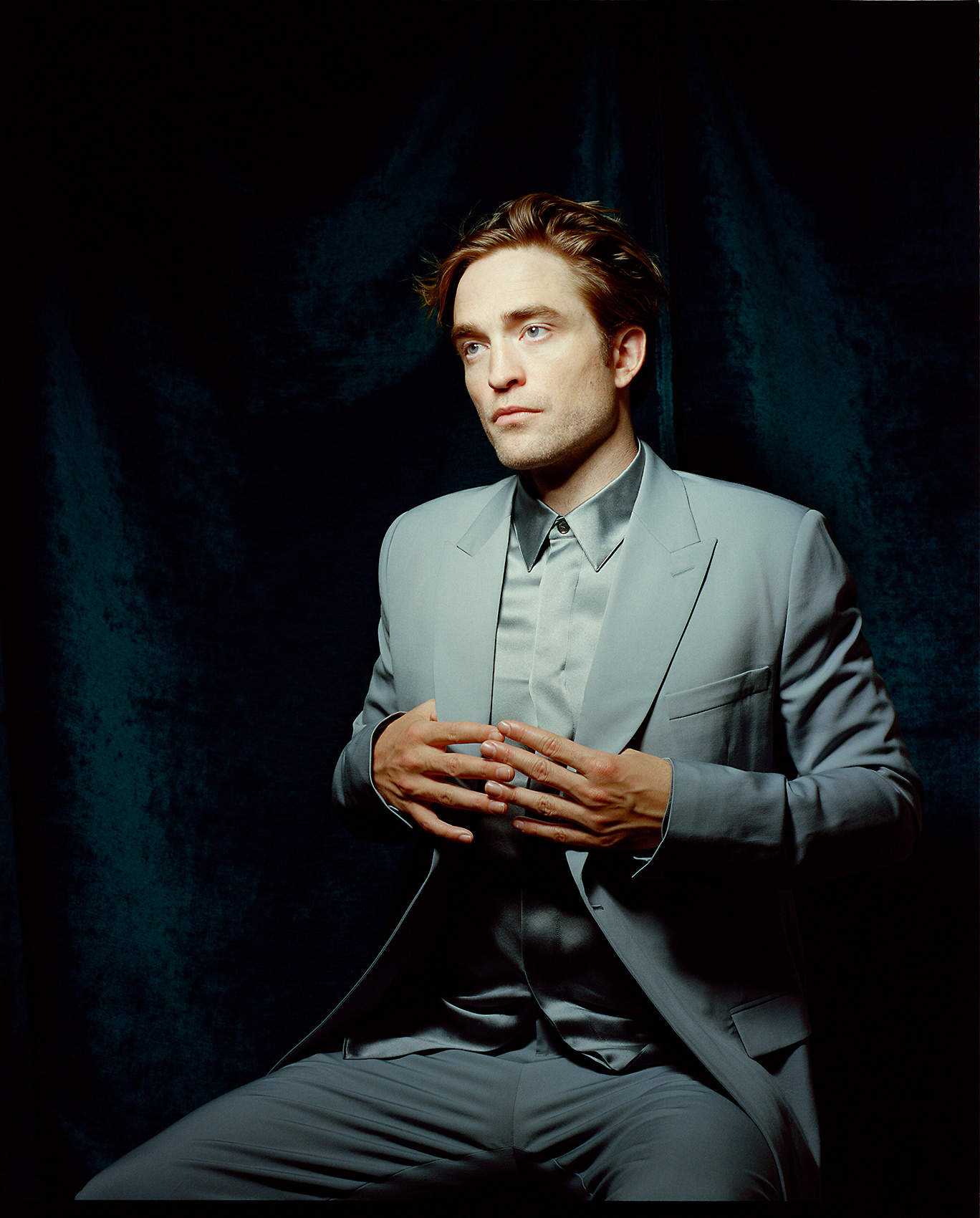 Rob Pattinson portrait against velvet
